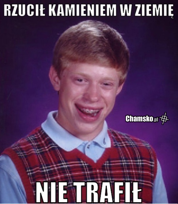 Rzucił kamieniem w ziemię..
